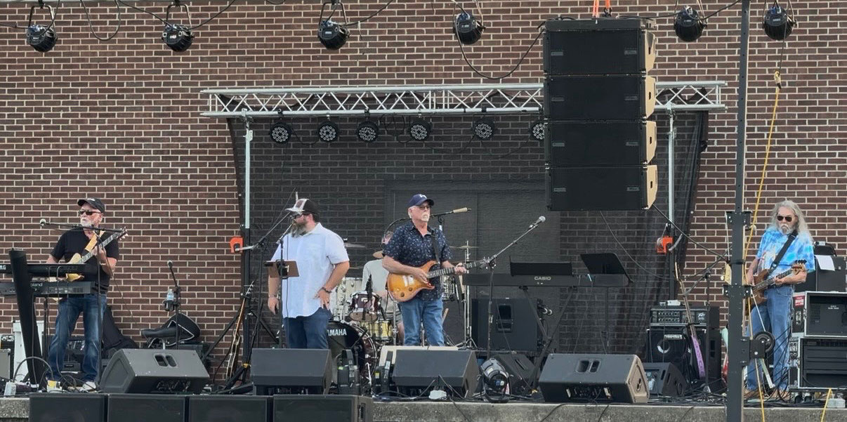Midnight Rain Band performing live on stage